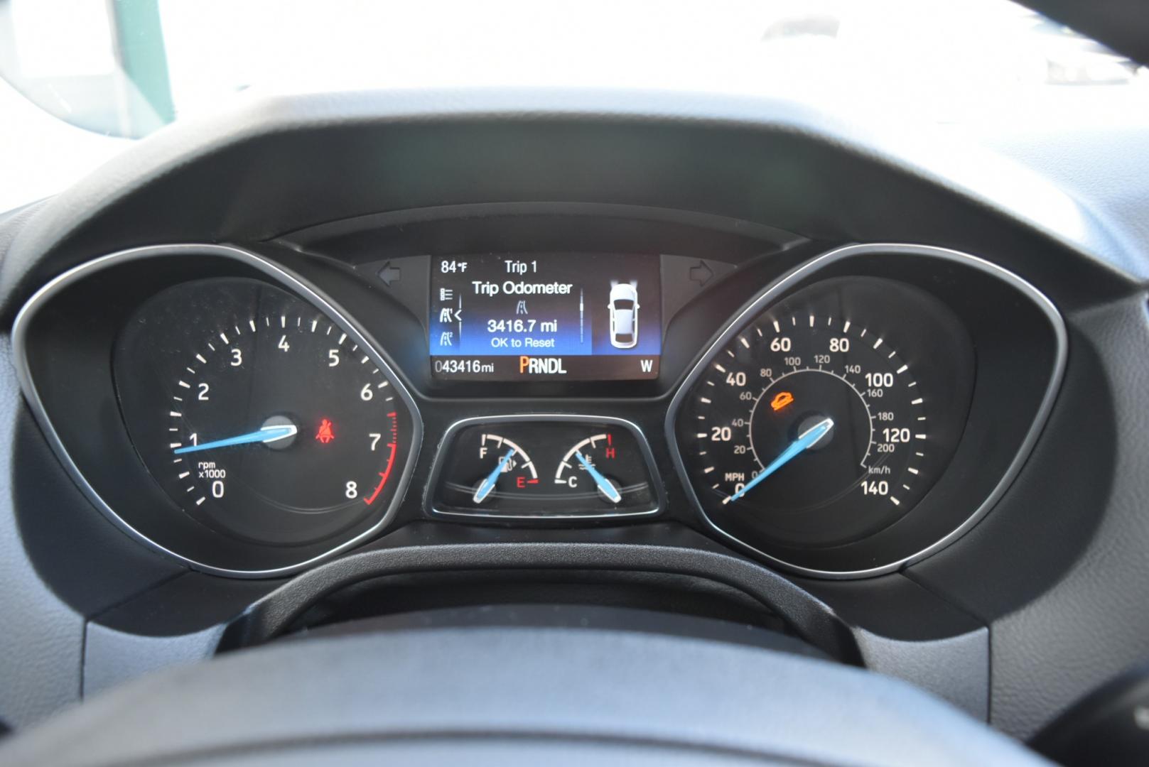 2018 White /Black Ford Focus SE (1FADP3F22JL) with an 2.0L I-4 GDI TI-VCT engine, 6-Speed Powershift Automatic transmission, located at 1600 E Hwy 44, Rapid City, SD, 57703, (605) 716-7878, 44.070232, -103.171410 - Photo#17